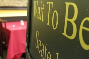 Please wait to be seated